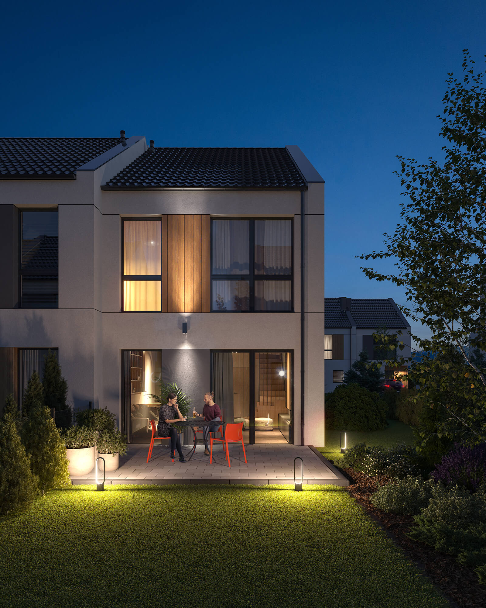 Bliźniak z tarasem wieczorem.