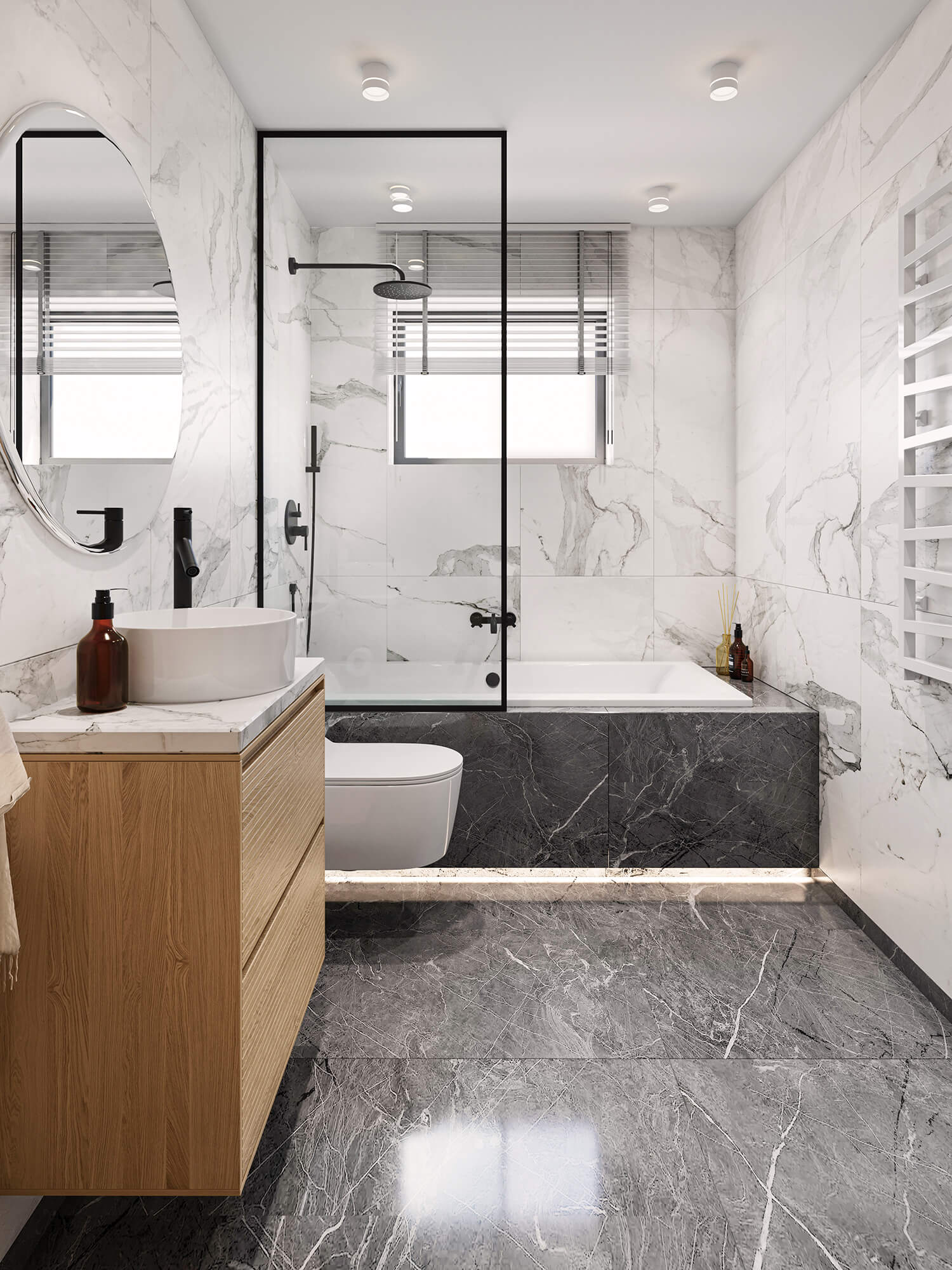 Łazienka z płytkami marmurowymi i okrągłym lustrem.