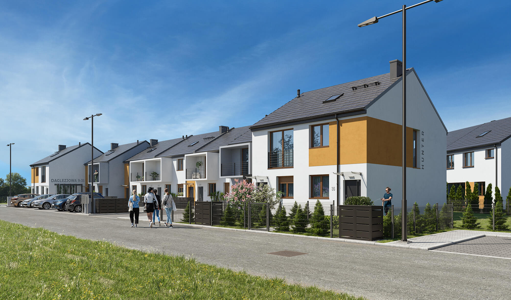 Osiedle z zabudową szeregową i ogródkami.