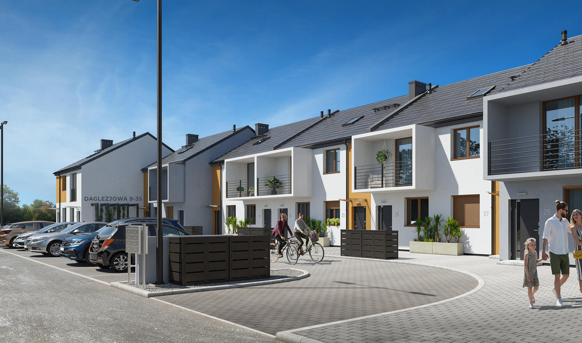 Wjazd do osiedla z zabudową szeregową i miejscami parkingowymi.