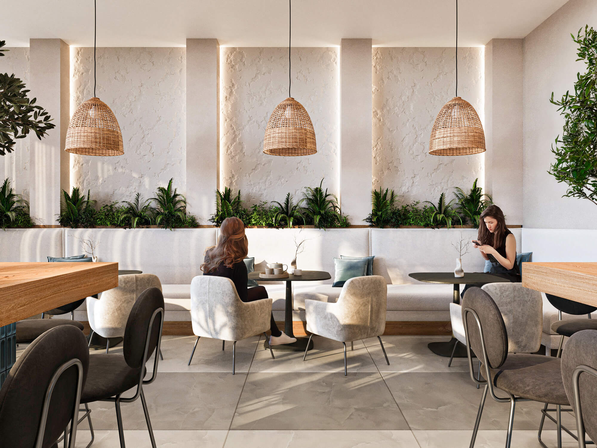 Restauracja w resorcie z jasnymi kanapami i lampami w stylu boho.