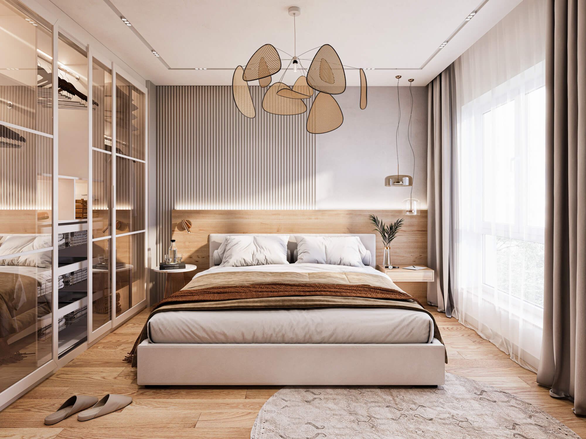 Jasna sypialnia z oszkloną szafą i dużym lustrem.