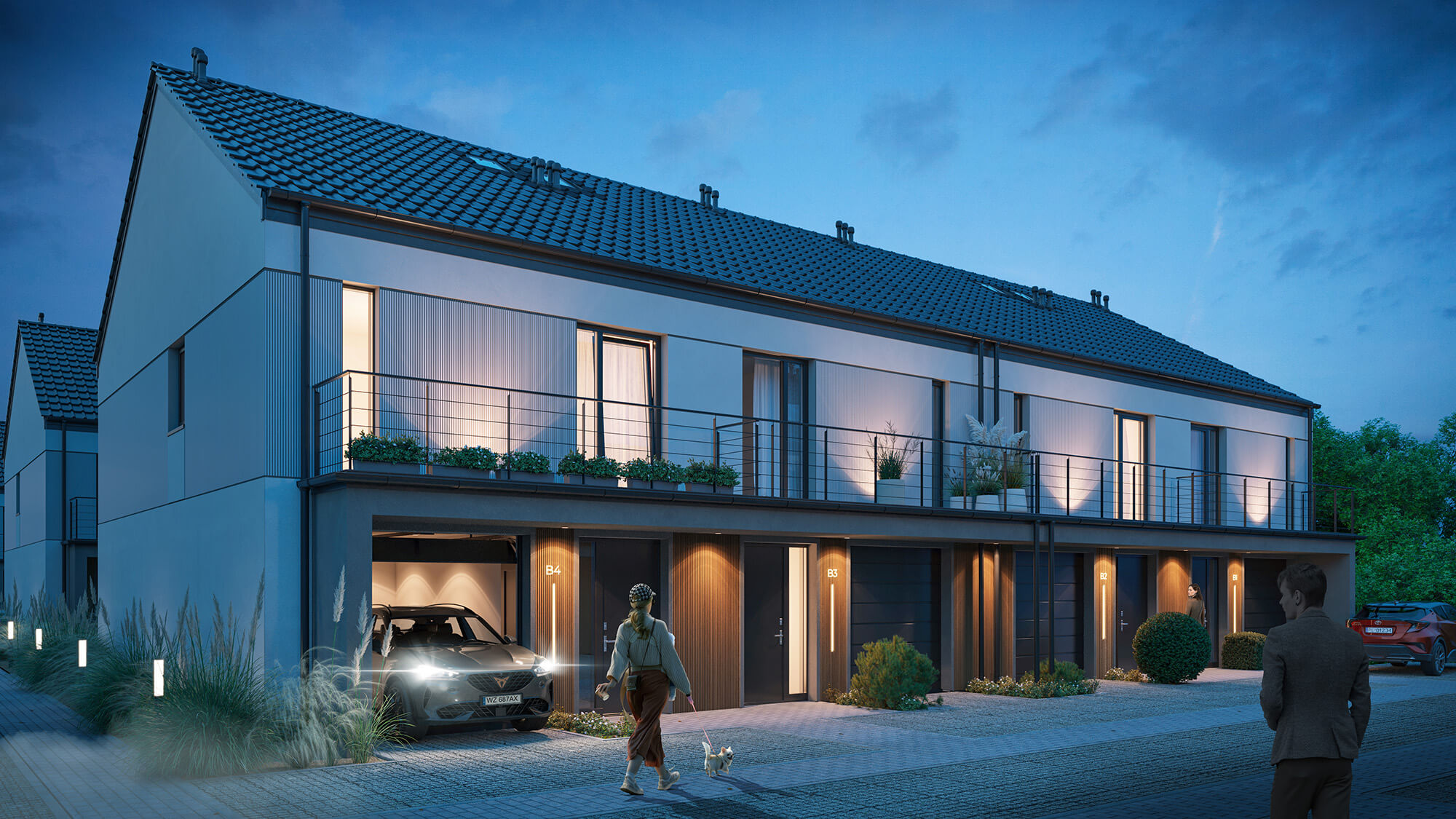 Szeregowiec z garażami wieczorem.