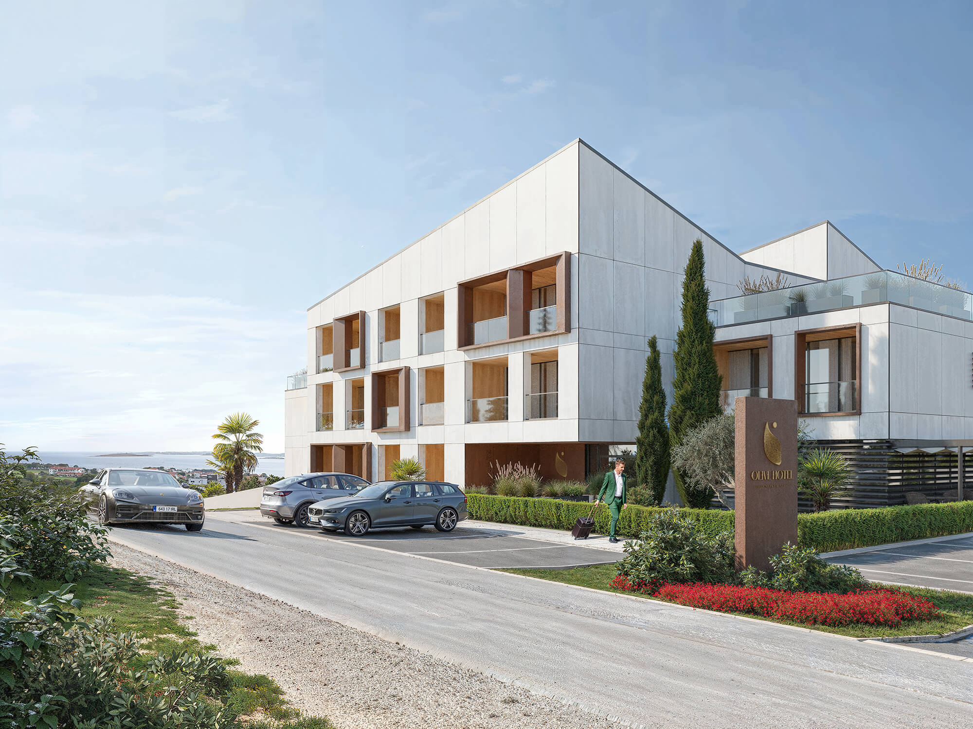 Podjazd do hotelu z parkingiem.