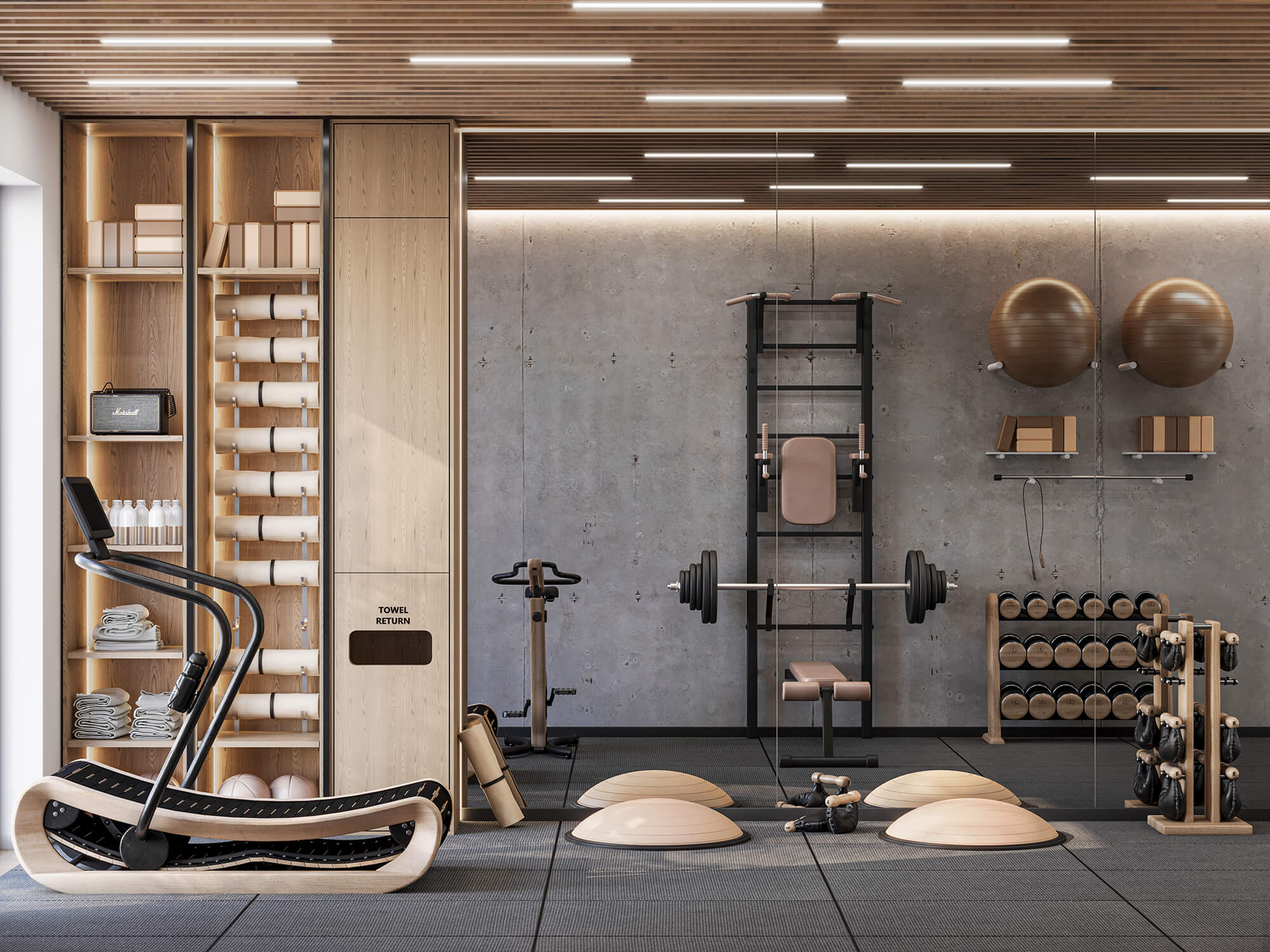 Hotelowa siłownia z dużymi lustrami.