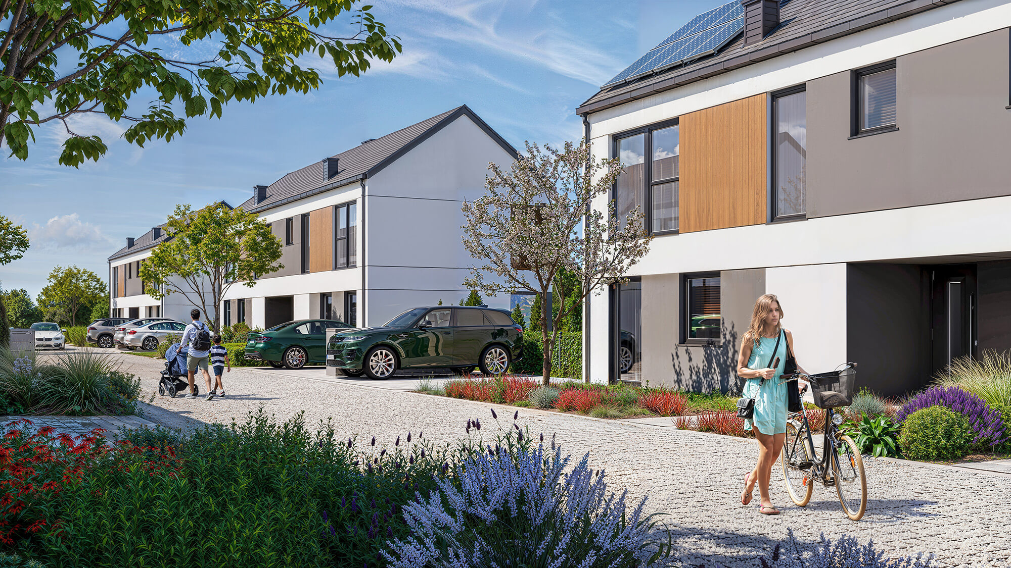 Podjazd do budynku szeregowego z miejscem parkingowym.