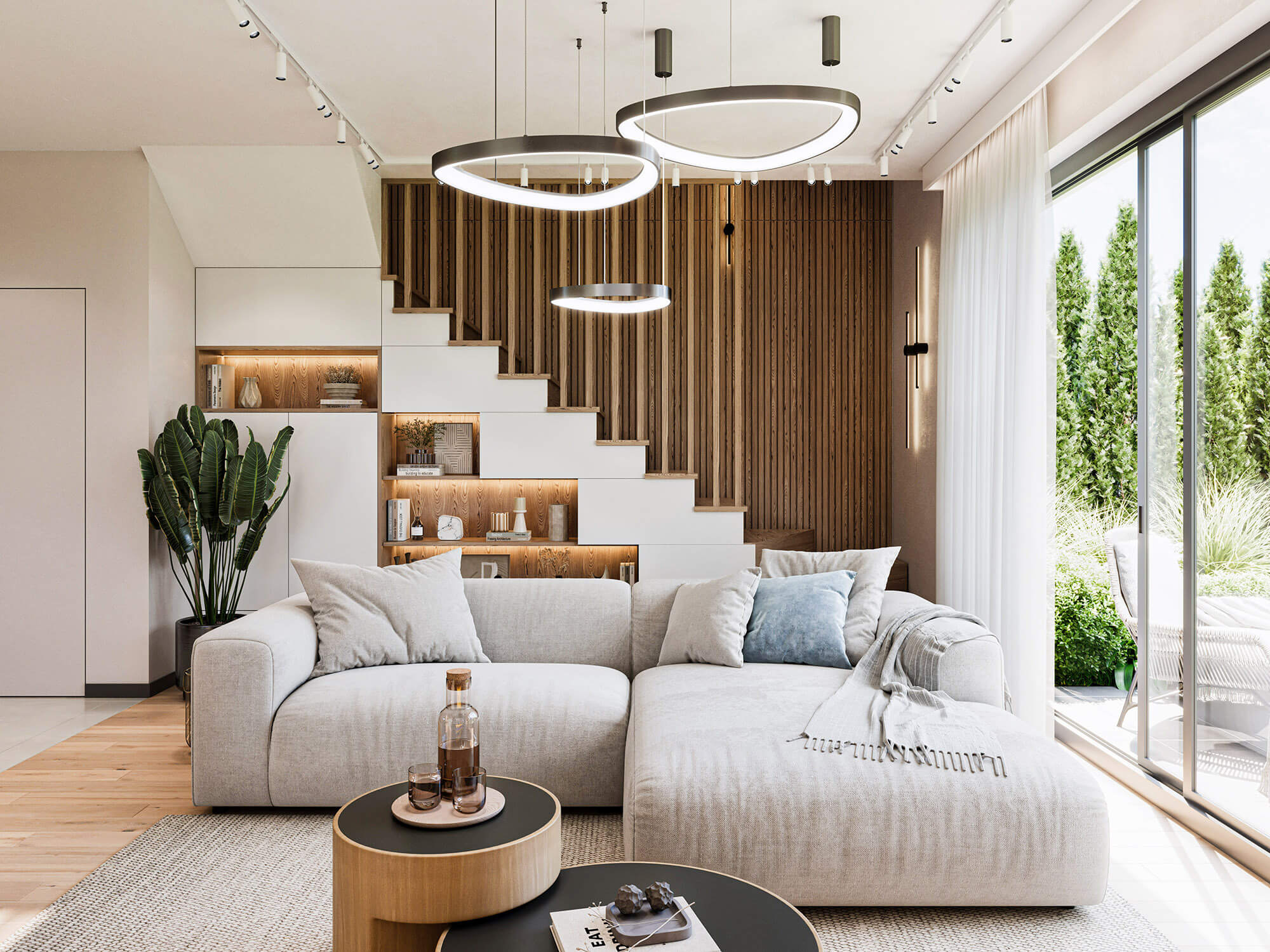 Wizualizacje 3D wnętrz inwestycji Tres Home - Salon z dużą, jasną kanapą i klatką schodową.