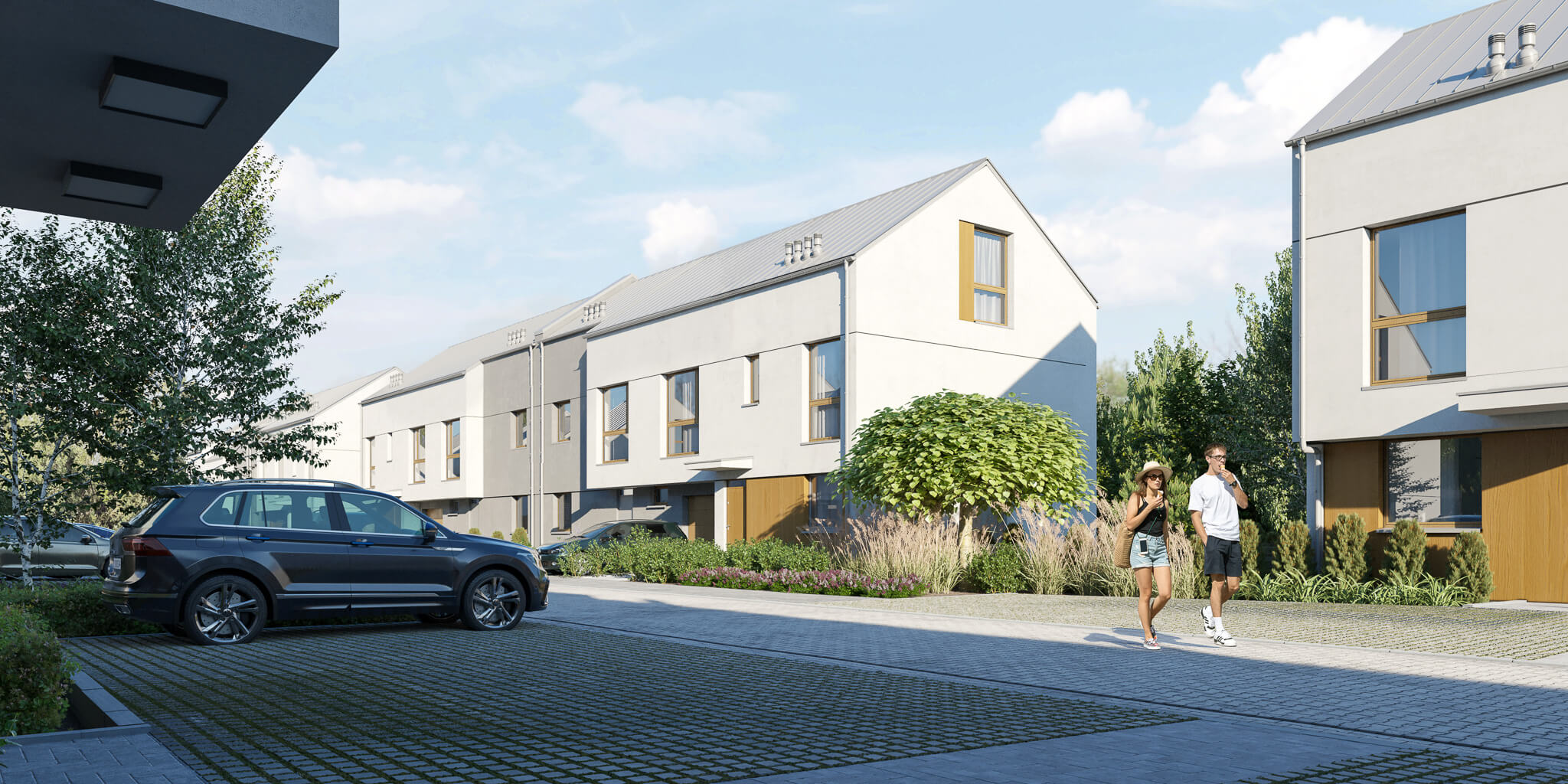 Osiedle szeregowe otoczone zielenią z miejscami parkingowymi.