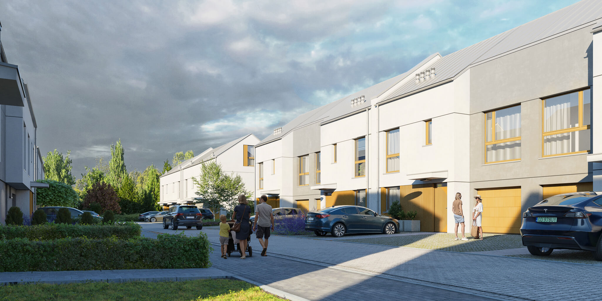 Wjazd na osiedle z zabudową bliźniaczą z miejscami parkingowymi.