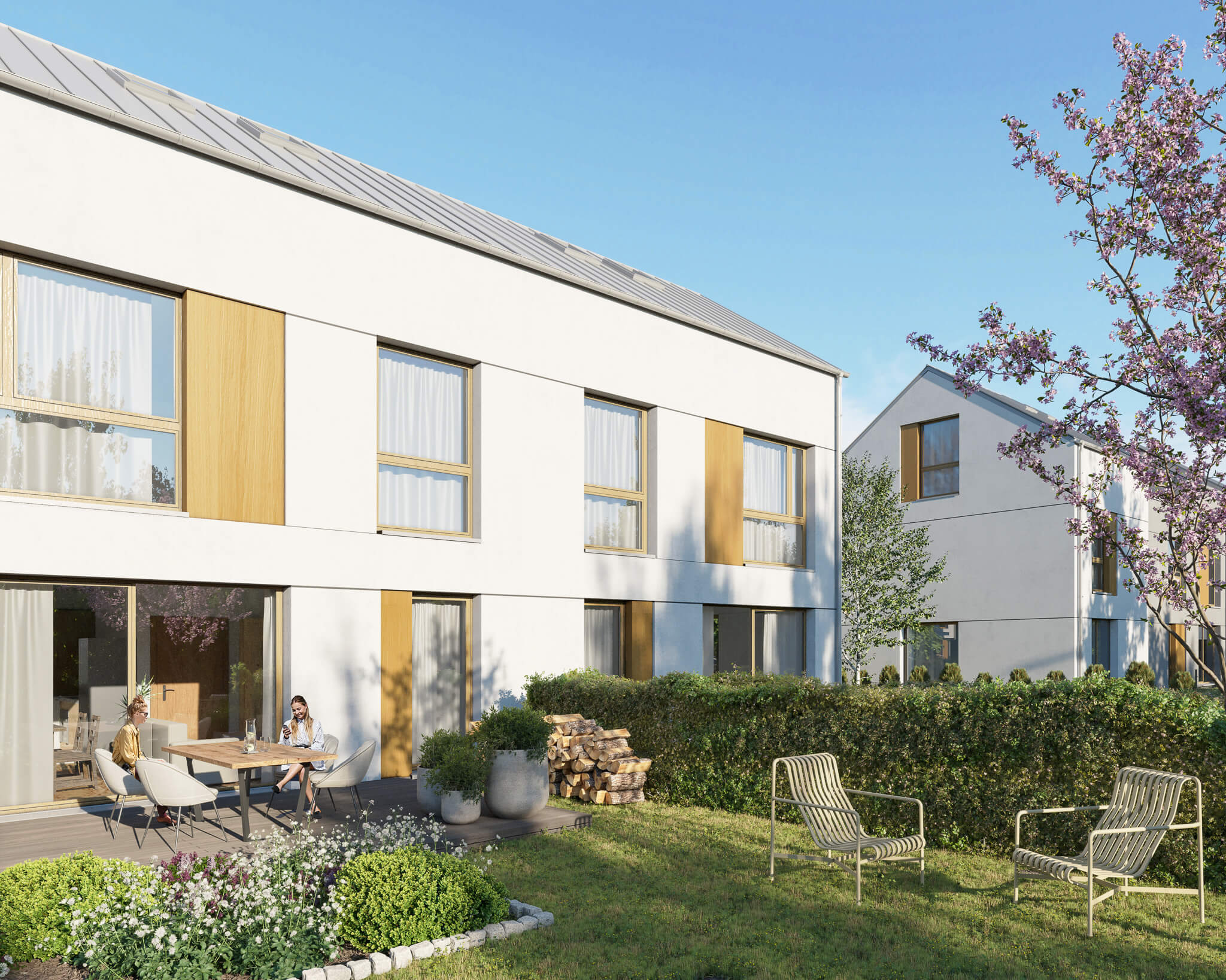 Taras z ogrodem przy budynku bliźniaczym.