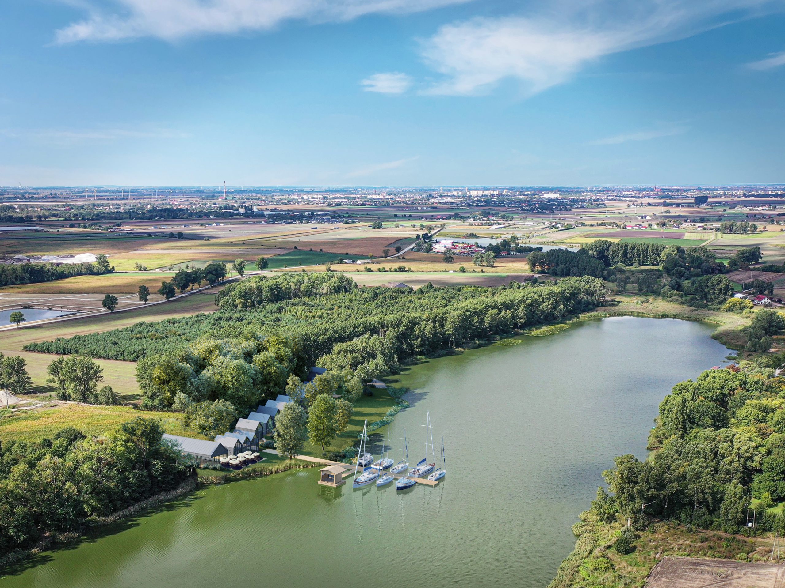 Widok z lotu ptaka na jezioro przy którym położna jest marina.