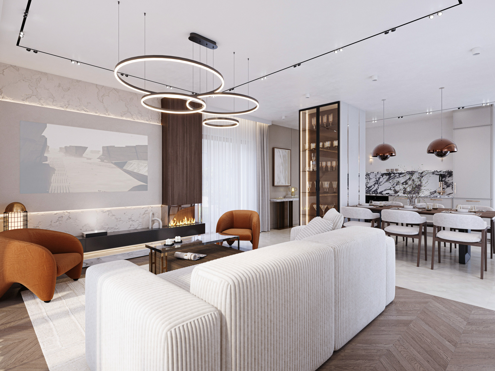 Strefa dzienna z kuchnią, jadalnią i salonem z jasną kanapą.