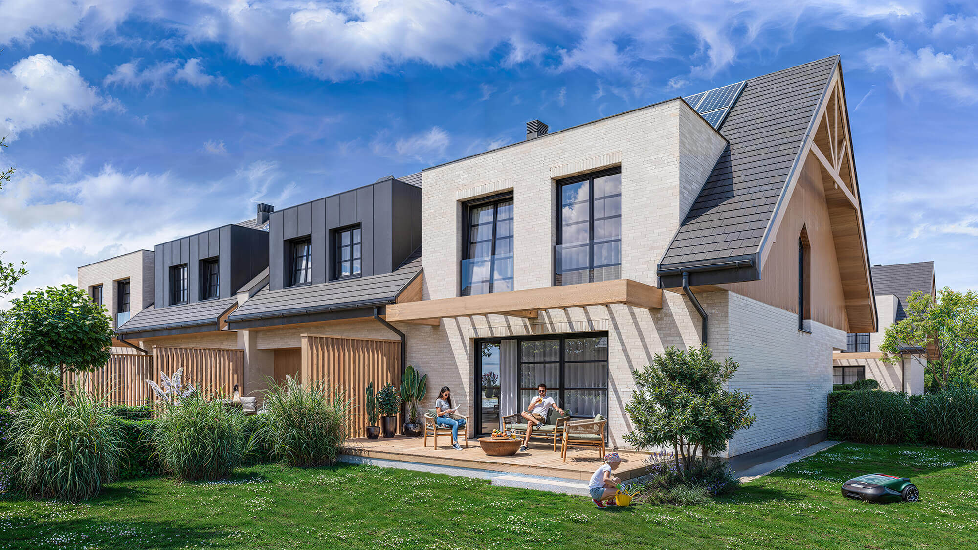 Budynek szeregowy, z ogrodem i tarasem z drewnianą posadzką.