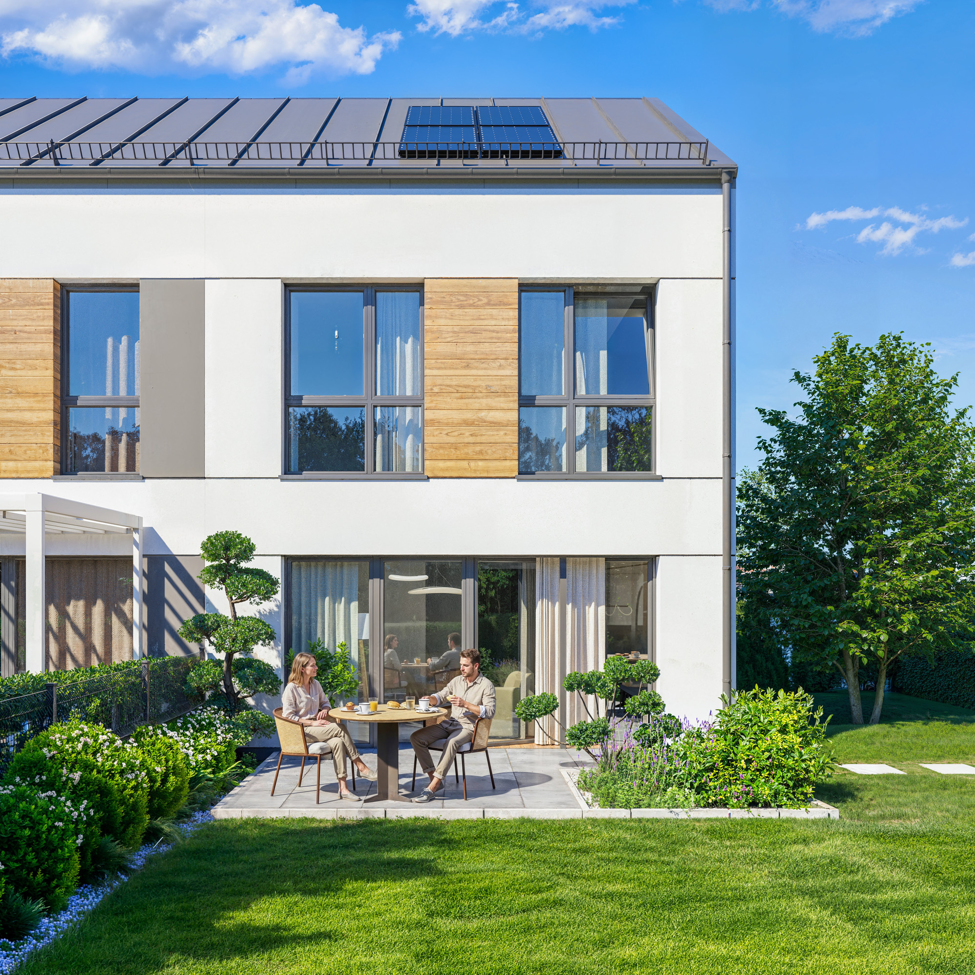 wizualizacje architektoniczne 3D — elewacja budynku szeregowego z ogrodem