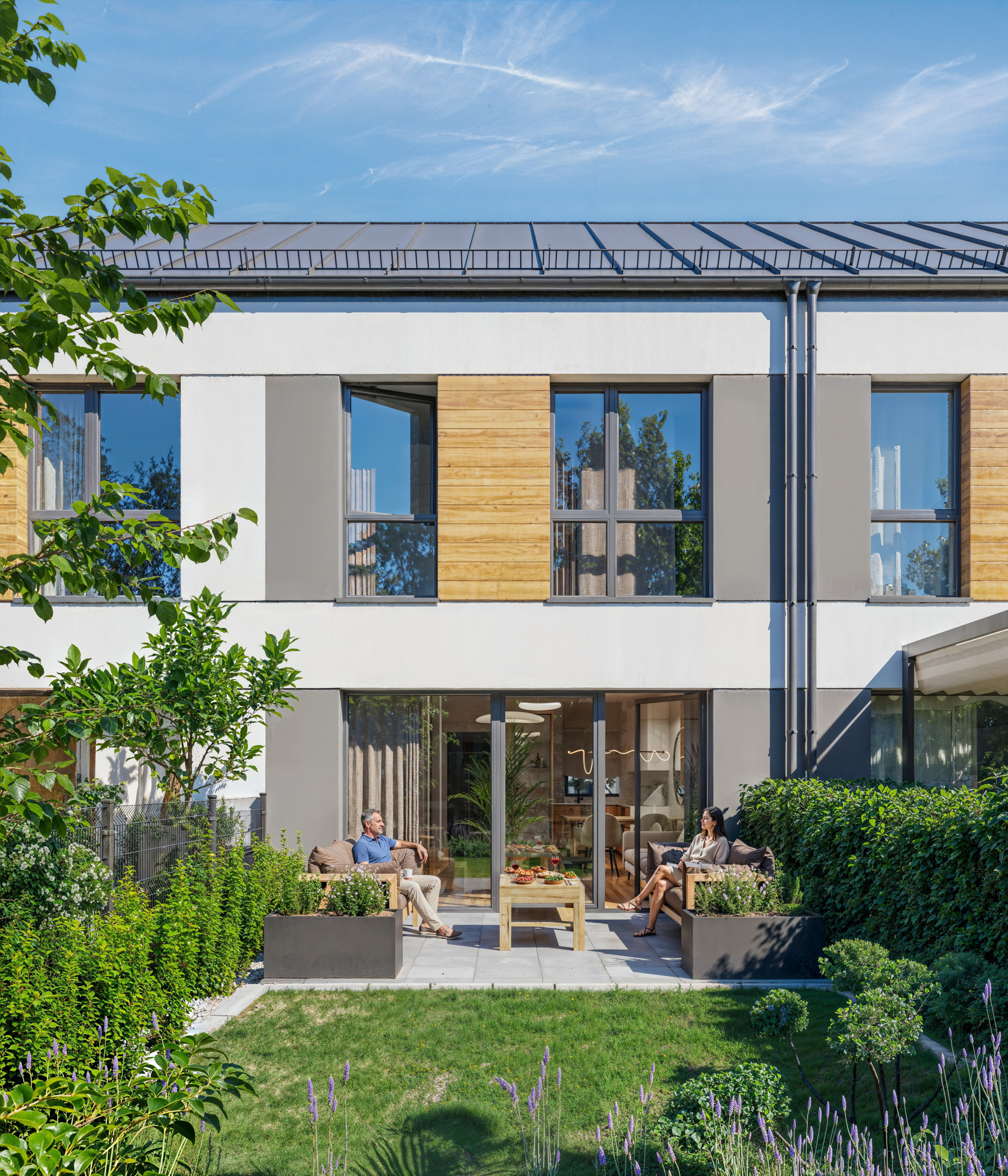 wizualizacje architektoniczne 3D — elewacja budynku szeregowego z ogrodem